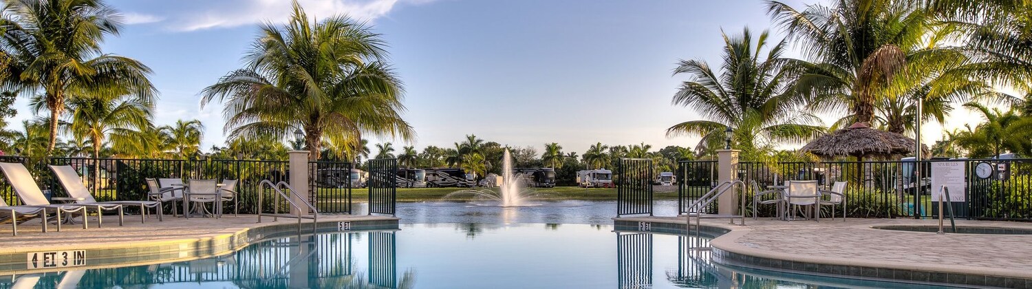 Fountain with Swimming Pool at Naples Motorcoach Resort Naples, Florida