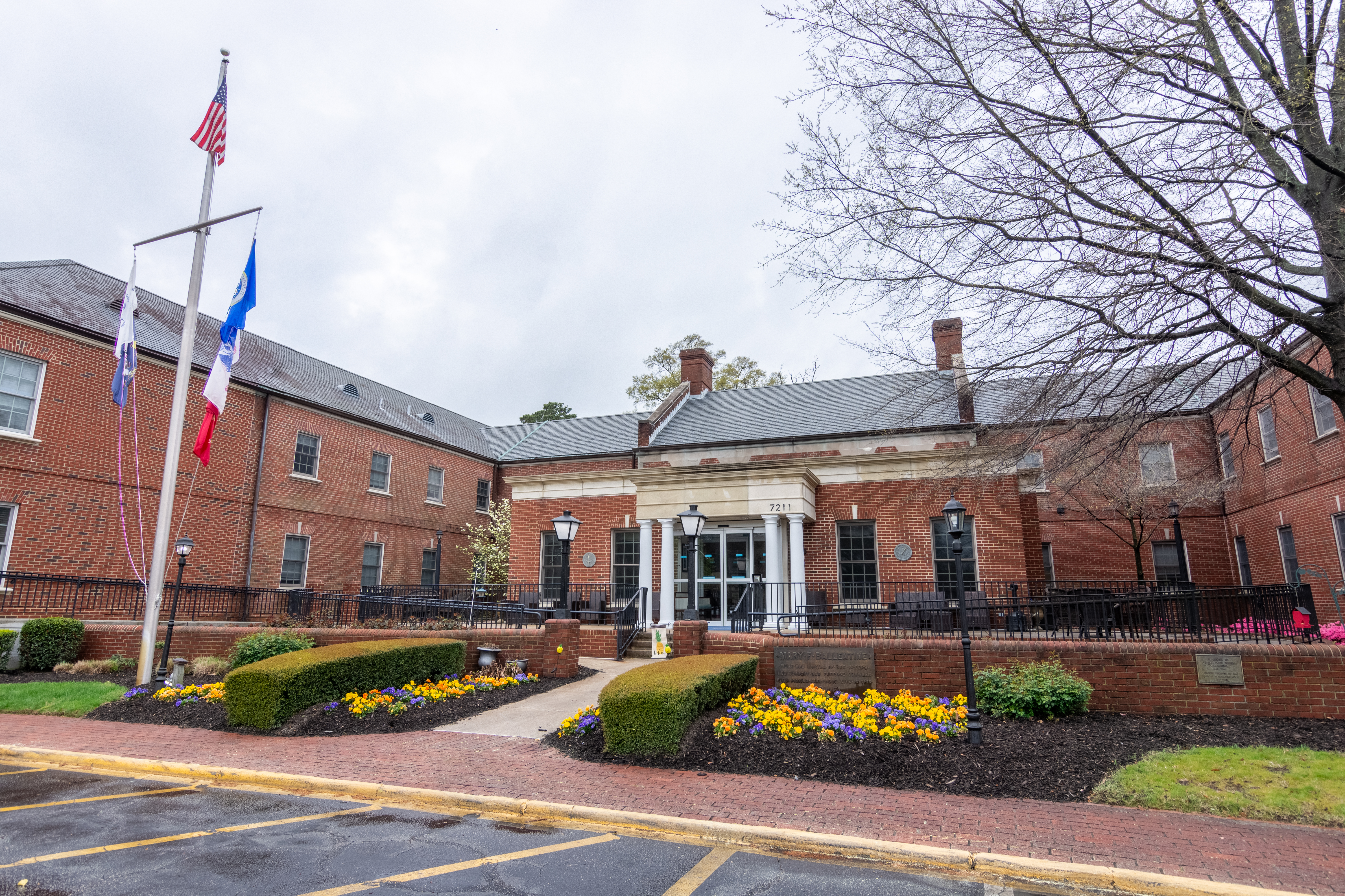 A building with flags in front of it