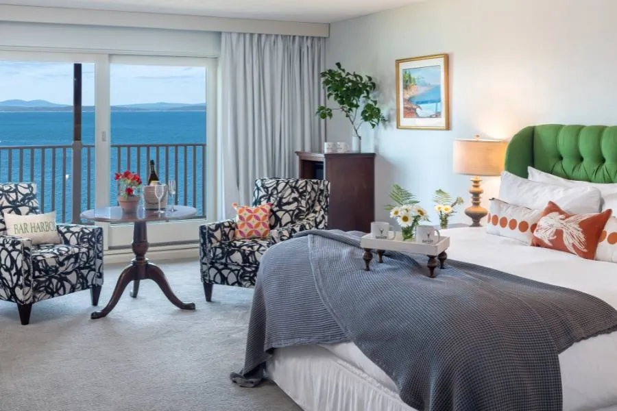 Comfortable room at the Bayview Hotel with a King bed and ocean view